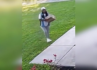 She drove across the lawn to deliver a package—the camera caught it all on video