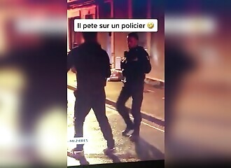 A policeman gets farted on