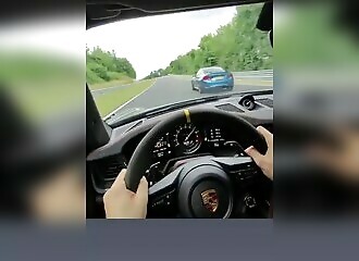 Accident between a Porsche and a BMW at the Nürburgring